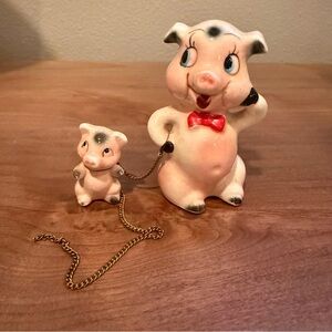 Vintage anthropomorphic porcelain sow pig with one piglet on chain